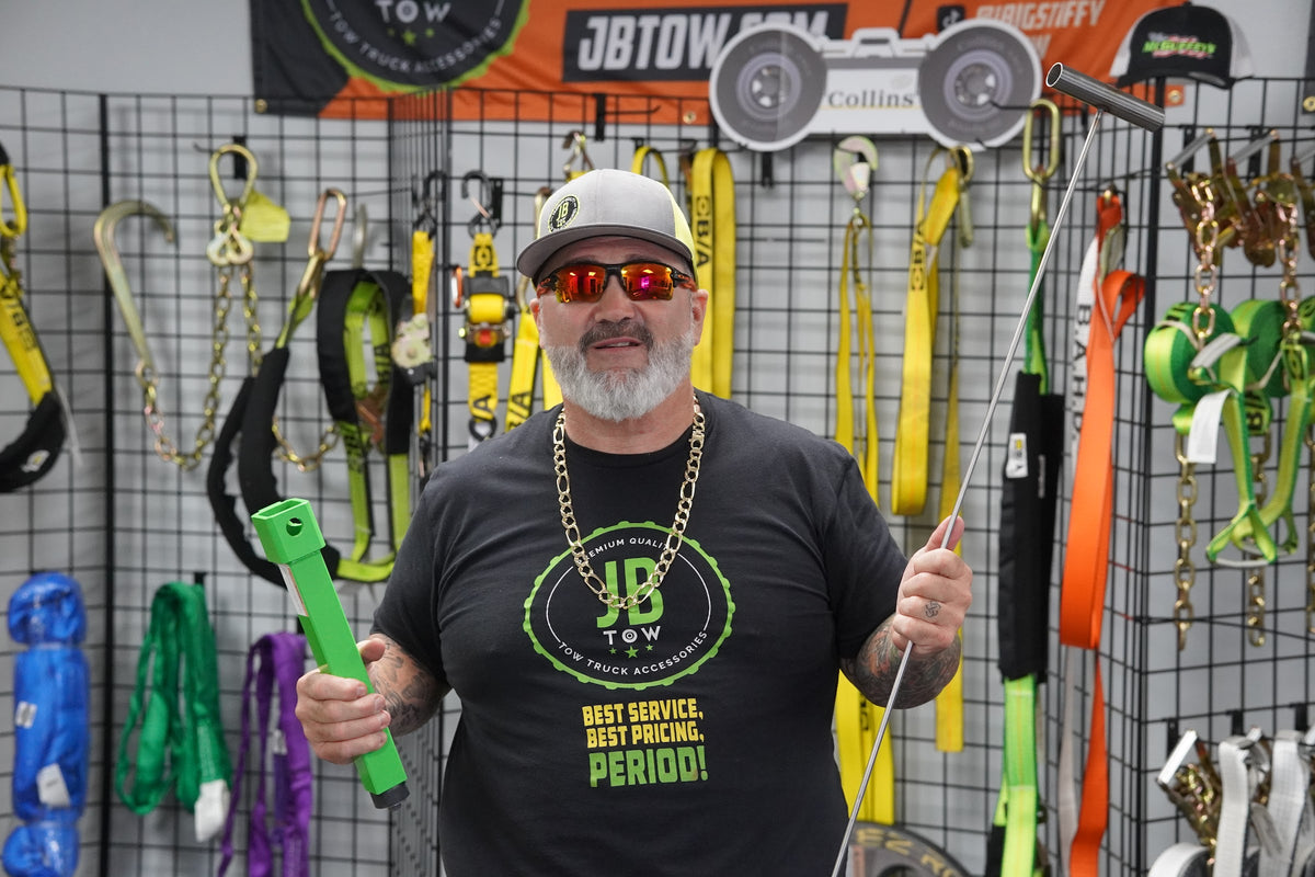 Jason Giddens in the JB Tow shop with the Big Stiffy and Fat Boy